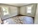 Spacious bedroom with hardwood floors and two windows at 2533 Aurie Dr, Indianapolis, IN 46219