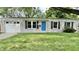 Brick ranch house with attached garage and landscaped lawn at 2533 Aurie Dr, Indianapolis, IN 46219