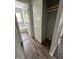 Hallway with closet and wood-look flooring at 2533 Aurie Dr, Indianapolis, IN 46219