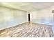Spacious living room with wood-look flooring at 2533 Aurie Dr, Indianapolis, IN 46219