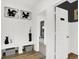 Bright entryway with built-in bench, storage, and access to a private restroom at 3608 Planck Cir, Danville, IN 46122