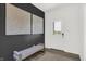 Modern entryway with a bench, large artwork, and wood-look flooring at 3608 Planck Cir, Danville, IN 46122