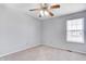 Cozy bedroom offering plush carpeting, ceiling fan, and a window with plenty of natural light at 368 Seabreeze Cir, Avon, IN 46123