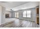 Bright living room with a fireplace, carpet, and new looking flooring at 368 Seabreeze Cir, Avon, IN 46123