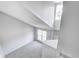 High angled view of an all white foyer area with high ceilings and natural lighting at 368 Seabreeze Cir, Avon, IN 46123
