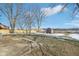 Large backyard with shed and snow on the ground at 4155 Senour Rd, Indianapolis, IN 46239