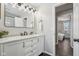 Updated bathroom with marble vanity and shower at 4155 Senour Rd, Indianapolis, IN 46239