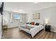 Spacious bedroom with a queen bed and stylish decor at 4155 Senour Rd, Indianapolis, IN 46239