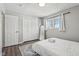 Cozy bedroom with a full-size bed and ample closet space at 4155 Senour Rd, Indianapolis, IN 46239