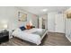 Main bedroom with king-size bed and walk-in closet at 4155 Senour Rd, Indianapolis, IN 46239