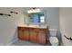 Bathroom with double vanity and neutral tile floor at 5131 Nicodemus Dr, Plainfield, IN 46168