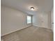 Well-lit bedroom featuring carpeted floor and window with blinds at 5131 Nicodemus Dr, Plainfield, IN 46168