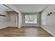 Living room with hardwood floors and large windows at 5131 Nicodemus Dr, Plainfield, IN 46168
