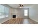 Living room with fireplace and hardwood floors at 5131 Nicodemus Dr, Plainfield, IN 46168