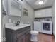 Bathroom with vanity, toilet, and washer/dryer at 5750 W 300 N Rd, Bargersville, IN 46106