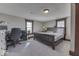 Spacious bedroom with large bed and home office at 5750 W 300 N Rd, Bargersville, IN 46106