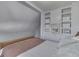 Bedroom with queen bed and built-in shelving at 5750 W 300 N Rd, Bargersville, IN 46106