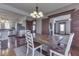 Open concept dining room with a view of the kitchen and living areas at 5750 W 300 N Rd, Bargersville, IN 46106