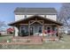 Two-story farmhouse with a large covered porch at 5750 W 300 N Rd, Bargersville, IN 46106
