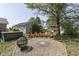 Landscaped fire pit area with seating, creating a cozy outdoor gathering space for friends and Gathering at 5750 W 300 N Rd, Bargersville, IN 46106