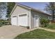 Spacious three-car garage with ample parking and storage space, set on a well-maintained lawn at 5750 W 300 N Rd, Bargersville, IN 46106
