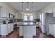 Updated kitchen with stainless steel appliances and an island at 5750 W 300 N Rd, Bargersville, IN 46106