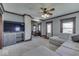 Living room with sectional sofa, TV, and built-in shelving at 5750 W 300 N Rd, Bargersville, IN 46106