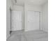 This room features neutral walls and carpet with a closet and access to another room at 7300 Legends Way, Whitestown, IN 46052