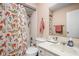 Clean bathroom with shower/tub combo and updated fixtures at 741 Ironwood Dr, Avon, IN 46123