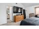 Main bedroom with large TV and ensuite bathroom at 741 Ironwood Dr, Avon, IN 46123