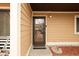 Front door entryway with a brown door and stone mat at 741 Ironwood Dr, Avon, IN 46123