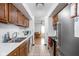 Kitchen with stainless steel appliances and wood cabinets at 741 Ironwood Dr, Avon, IN 46123