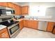 Close up of an updated kitchen with modern stainless steel appliances at 833 Palisades Ct, Greenwood, IN 46143