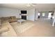 Open living room featuring a fireplace and plush seating at 833 Palisades Ct, Greenwood, IN 46143