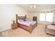 Inviting bedroom with a wooden bed, dressers and well-lit space at 833 Palisades Ct, Greenwood, IN 46143