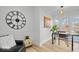 Bright home office with a desk, window seat, and hardwood floors at 923 E Pleasant Run Pkwy S Dr, Indianapolis, IN 46203