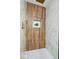 Spa-like shower with marble and wood-look tile and a rain shower head at 923 E Pleasant Run Pkwy S Dr, Indianapolis, IN 46203