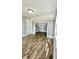 Spacious bedroom with wood flooring, neutral walls and an additional room at 929 N Bancroft St, Indianapolis, IN 46201