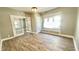 Spacious dining room with hardwood floors and French doors at 929 N Bancroft St, Indianapolis, IN 46201