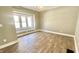 Dining room with hardwood floors and built-in window seat at 929 N Bancroft St, Indianapolis, IN 46201