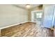 Bright dining room with hardwood floors and French doors at 929 N Bancroft St, Indianapolis, IN 46201