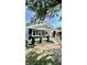 Renovated bungalow with a gray exterior and a spacious front porch at 929 N Bancroft St, Indianapolis, IN 46201