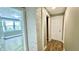 Long hallway with hardwood floors and exposed brick at 929 N Bancroft St, Indianapolis, IN 46201
