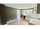 Updated kitchen with white cabinets, subway tile backsplash, and new flooring at 929 N Bancroft St, Indianapolis, IN 46201