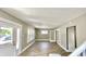 Living room with hardwood floors and neutral-toned walls and trim at 929 N Bancroft St, Indianapolis, IN 46201