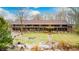 Long home with landscaping and circular driveway at 9600 N 500 E, Pendleton, IN 46064