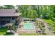 Aerial view of a pool and outdoor entertaining space surrounded by lush trees and landscaping at 9600 N 500 E, Pendleton, IN 46064