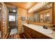 Bathroom with double vanity and wood cabinets at 9600 N 500 E, Pendleton, IN 46064