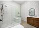 Elegant bathroom with a marble shower and floral wallpaper at 9600 N 500 E, Pendleton, IN 46064