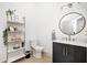 Stylish powder room with a dark vanity and gold accents at 9600 N 500 E, Pendleton, IN 46064